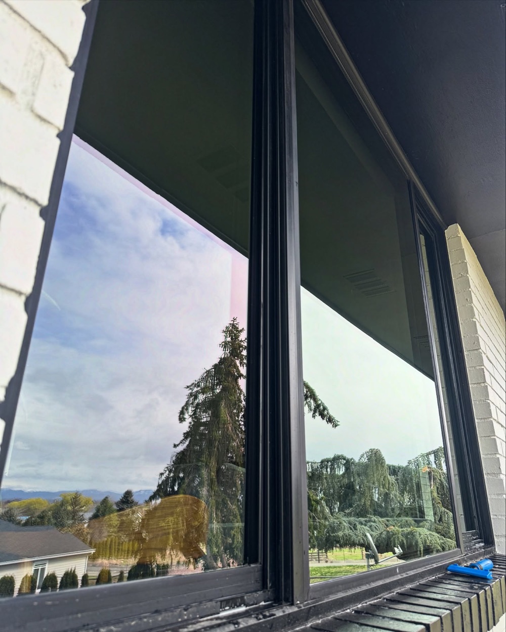 The same window cleaning job after Allen's Property Services finished.